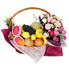 Composition de fleurs avec des fruits
