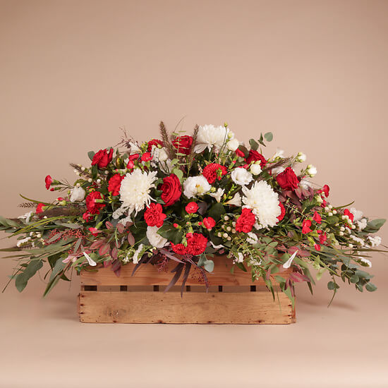 Rot-weiße Trauergarbe – Blumenlieferung Schweiz